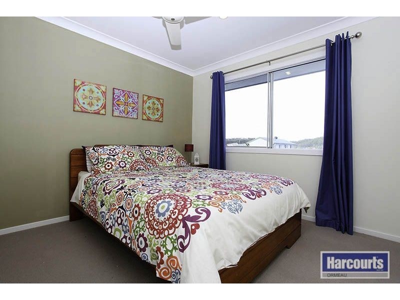 12 Norfolk Drive, Pacific Pines QLD 4211