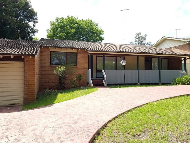 10 Woodhouse Drive, Ambarvale NSW 2560