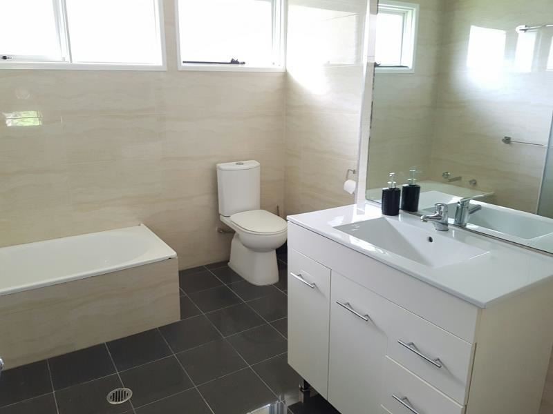 10 Woodhouse Drive, Ambarvale NSW 2560