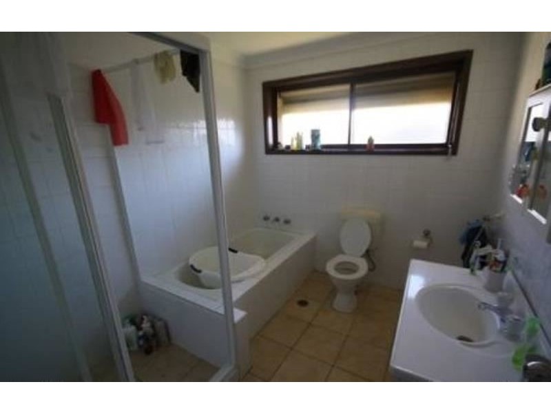 31 Fuchsia Crescent, Macquarie Fields NSW 2564