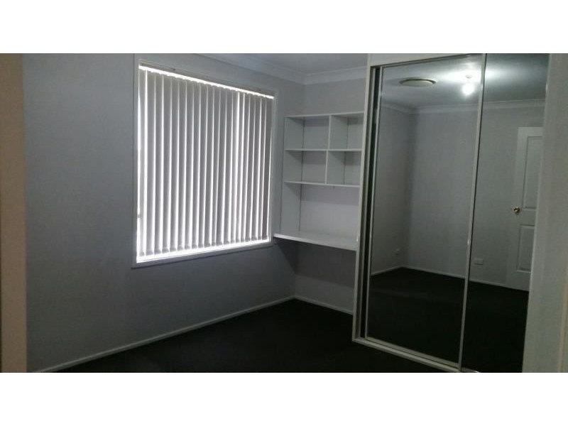 21 CLENNAM AVENUE, Ambarvale NSW 2560