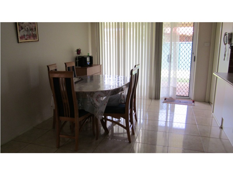 28 Groundsel Ave, Macquarie Fields NSW 2564