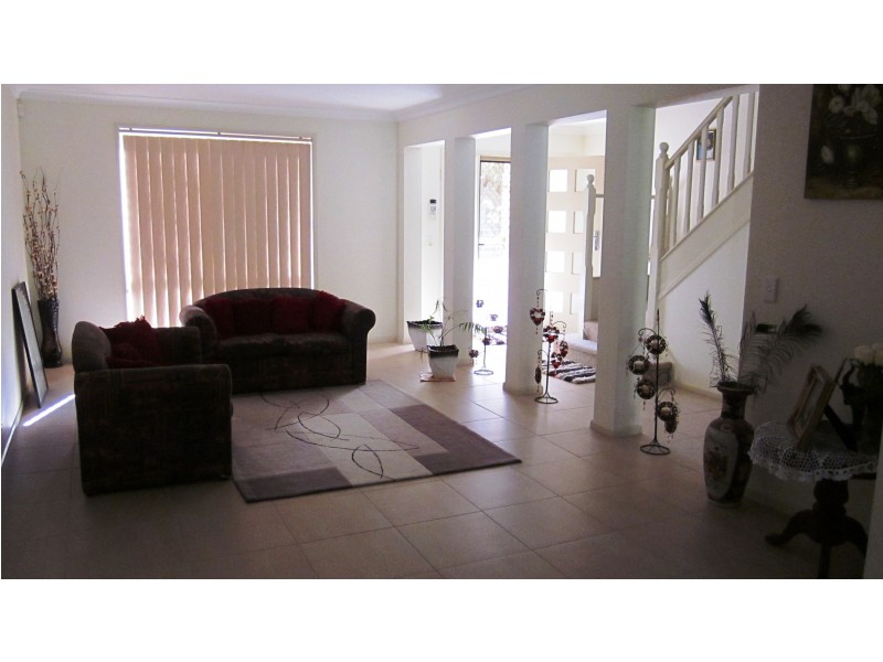 23 Belmont Rd, Glenfield NSW 2167