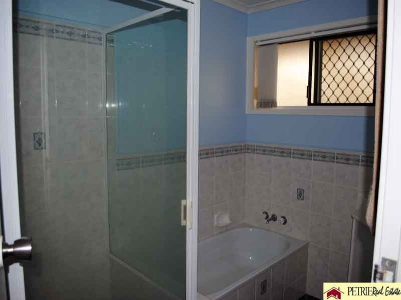 16 Woodlands Avenue, Petrie QLD 4502