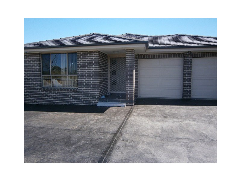 15 Guardian Cres, Glenfield NSW 2167