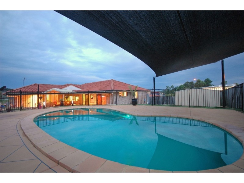 4 Chatham Avenue, Pacific Pines QLD 4211