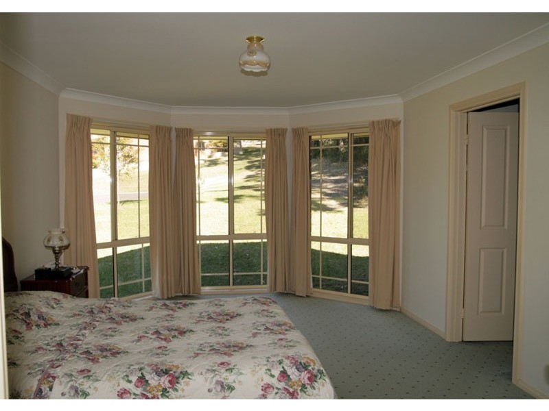 18 Woodalla Way, Narrawallee NSW 2539