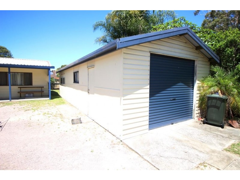 13 Seventh Ave, Stuarts Point NSW 2441