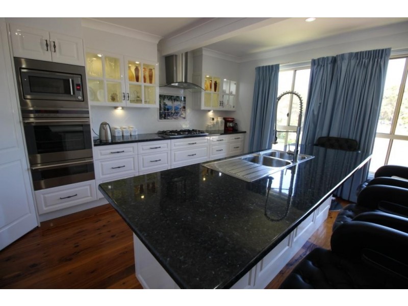 7 Grevillea Ave, Stuarts Point NSW 2441