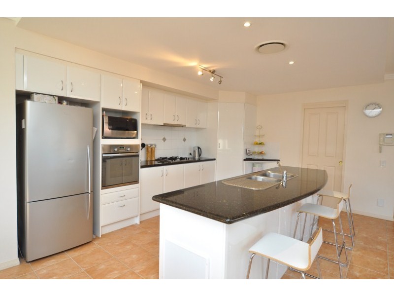 12 Stromlo Court, Pacific Pines QLD 4211