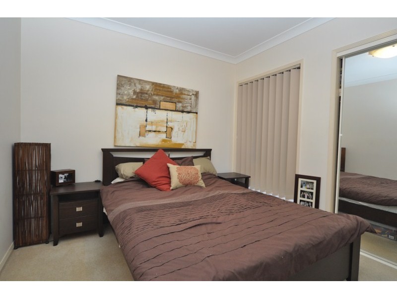 12 Stromlo Court, Pacific Pines QLD 4211