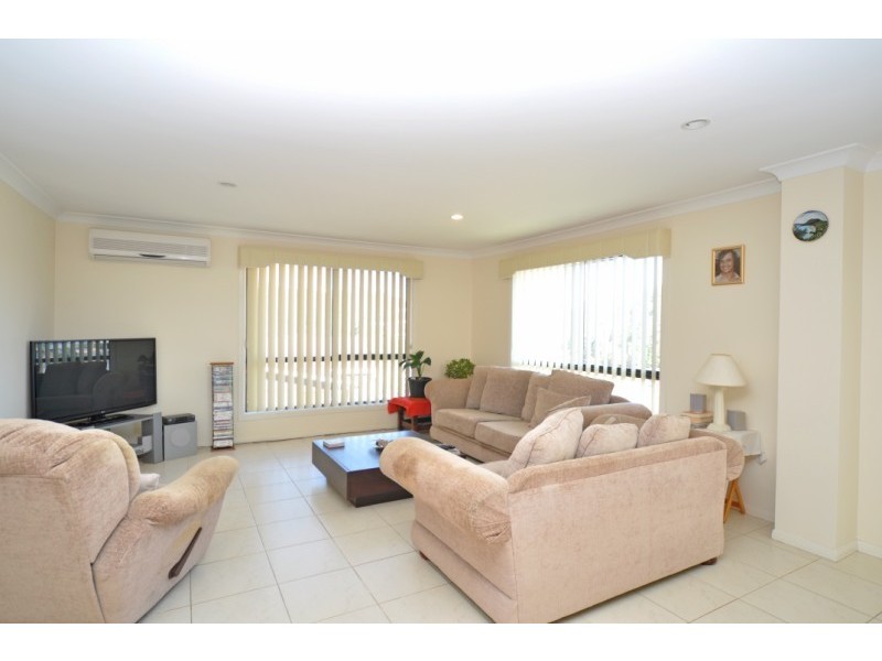 23 Manra Way, Pacific Pines QLD 4211