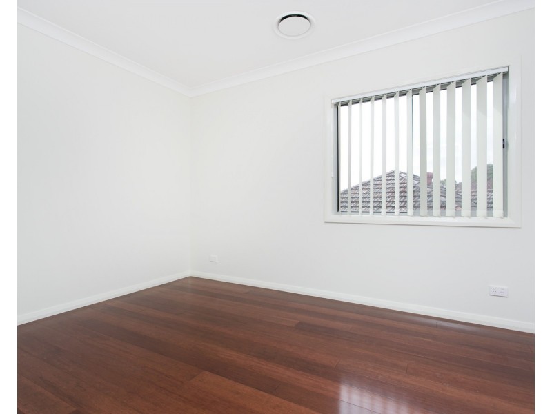 595 Henry Lawson Drive, East Hills NSW 2213