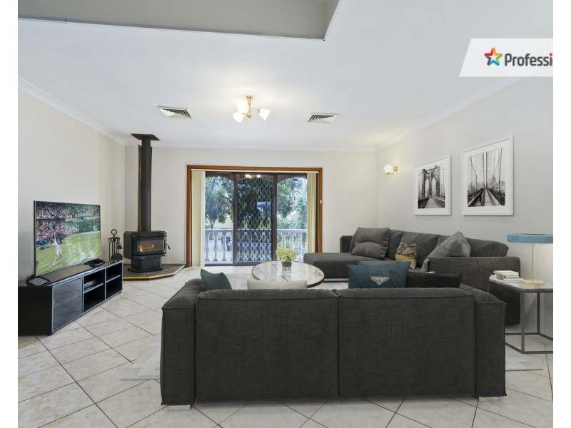 15 Biloolo Road, Green Valley NSW 2168