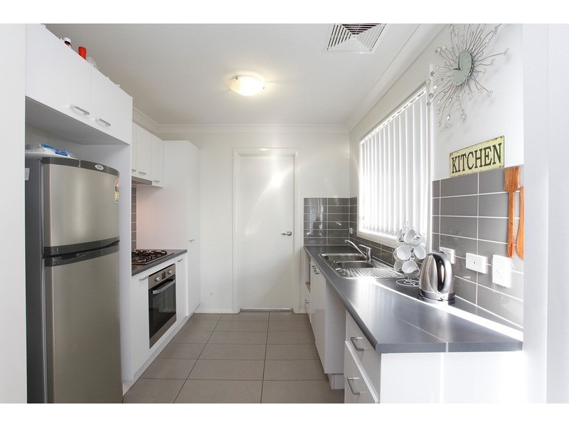 15 Grenada Road, Glenfield NSW 2167