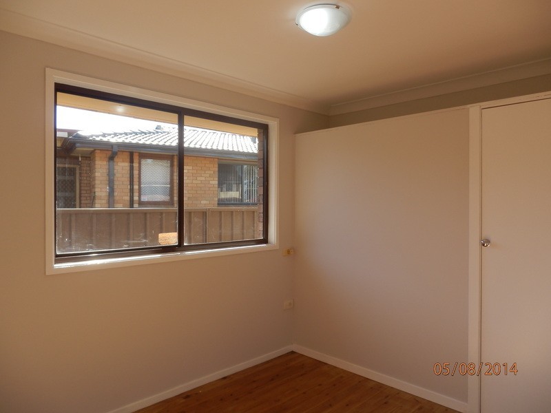 6 Robinson  Close, Lurnea NSW 2170