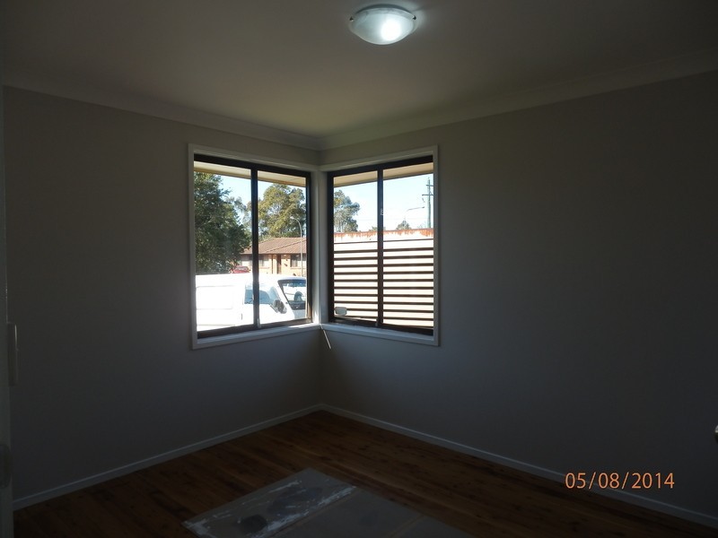 6 Robinson  Close, Lurnea NSW 2170