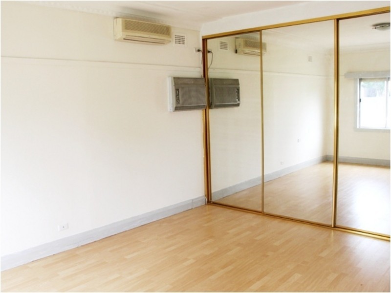 242 Henry Lawson Drive, Georges Hall NSW 2198