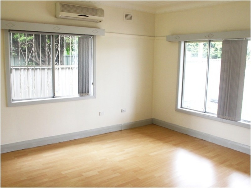 242 Henry Lawson Drive, Georges Hall NSW 2198