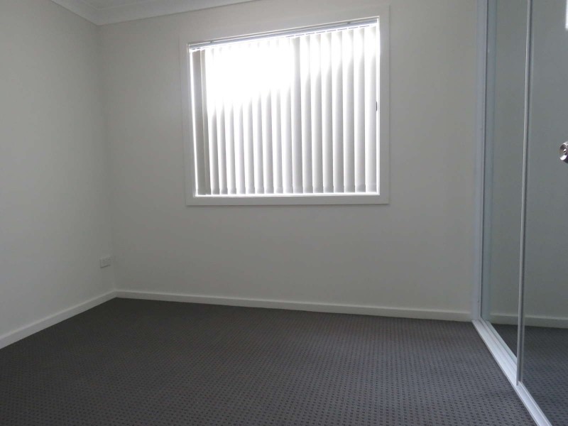 3A Groundsel Avenue, Macquarie Fields NSW 2564
