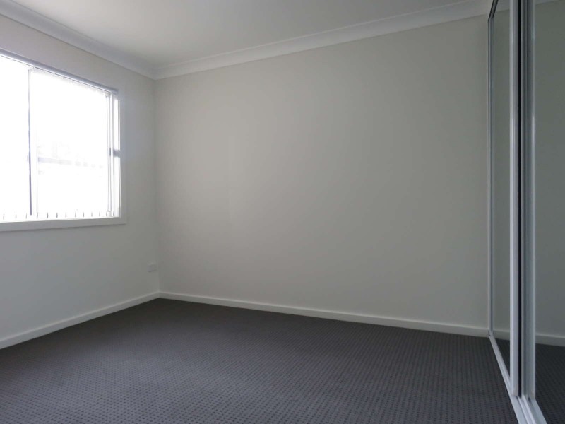 3A Groundsel Avenue, Macquarie Fields NSW 2564