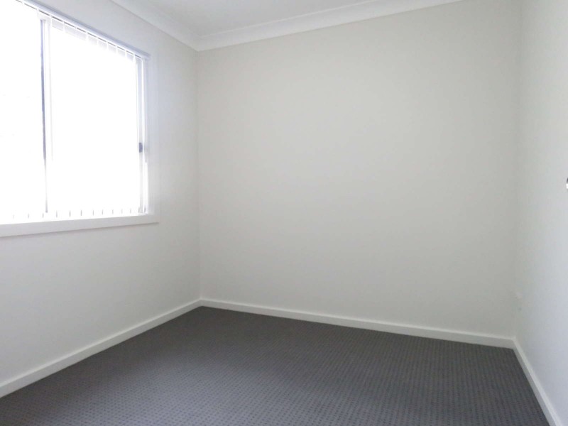 3A Groundsel Avenue, Macquarie Fields NSW 2564