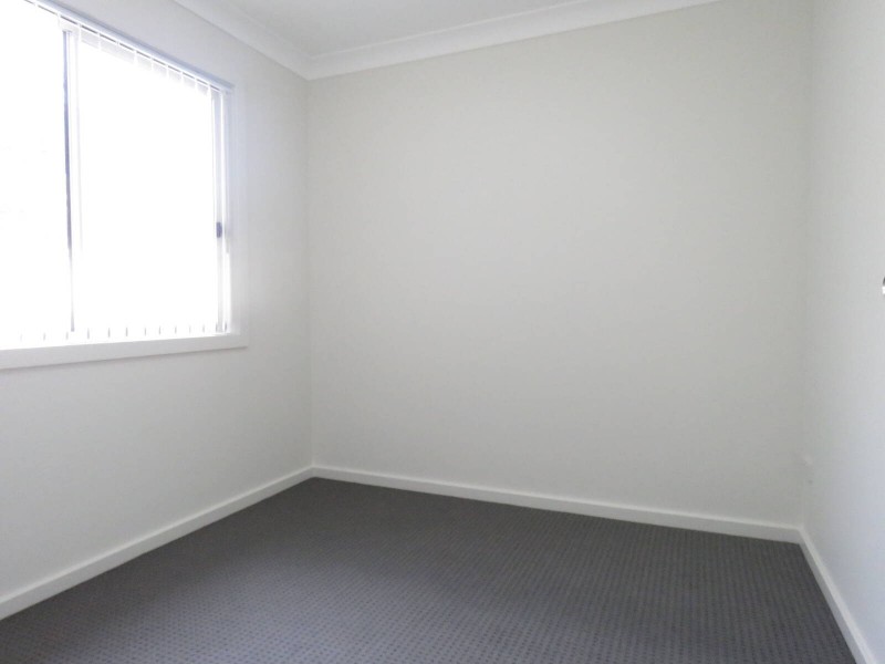 3A Groundsel Avenue, Macquarie Fields NSW 2564
