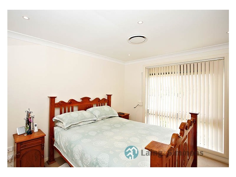 64 Tallowood Crescent, Bossley Park NSW 2176