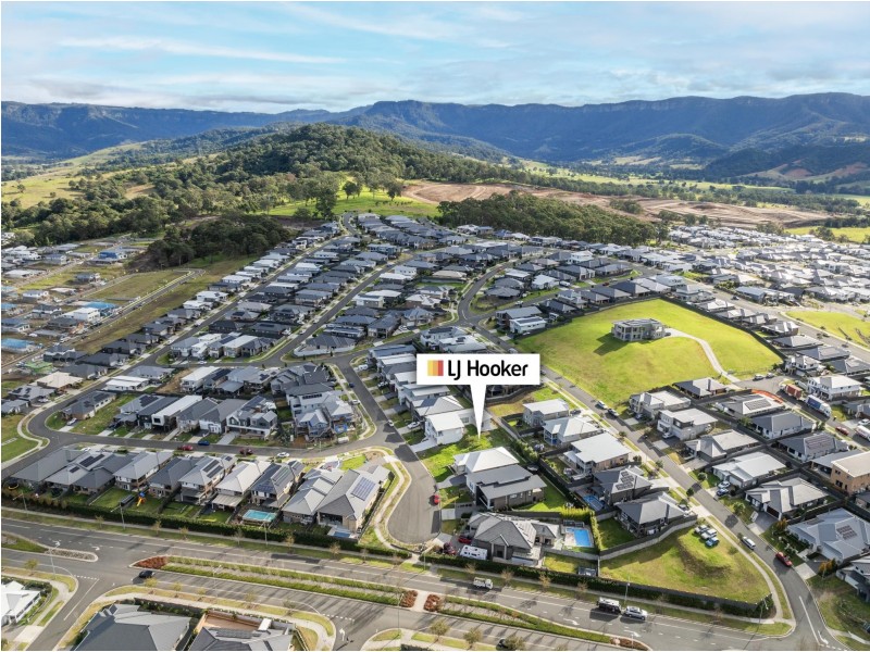 15 Mcnevin Close, Calderwood NSW 2527