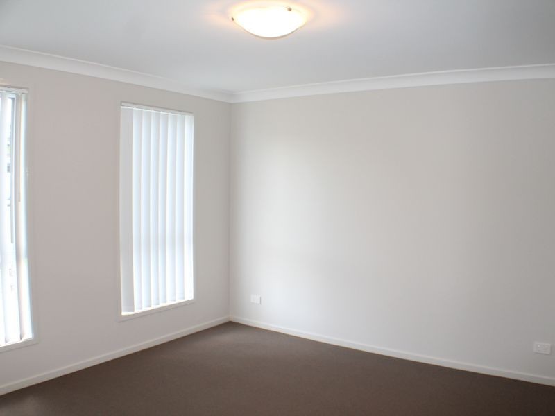 11 Outlook Boulevard, Fletcher NSW 2287