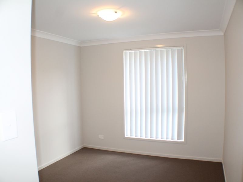 11 Outlook Boulevard, Fletcher NSW 2287