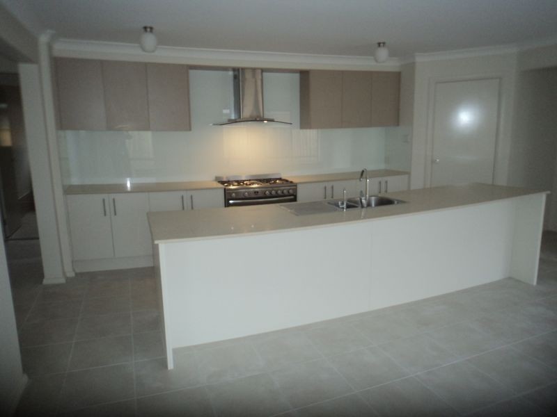 23 Honeysuckle Drive, Aberglasslyn NSW 2320