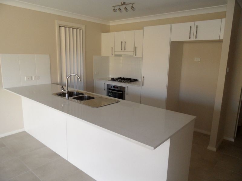 2/12 Dunnart Street, Aberglasslyn NSW 2320