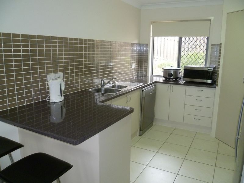 59 Harmsworth Road, Pacific Pines QLD 4211