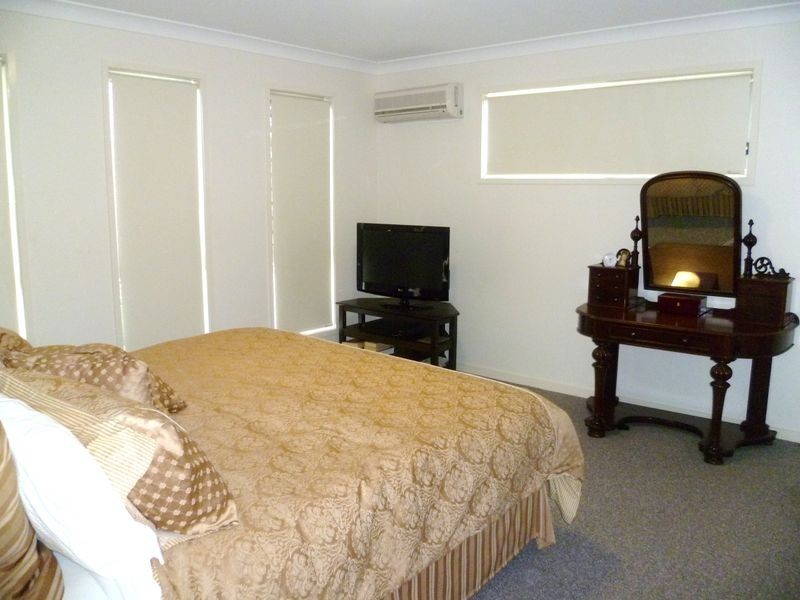 59 Harmsworth Road, Pacific Pines QLD 4211