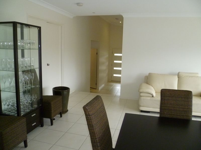 59 Harmsworth Road, Pacific Pines QLD 4211