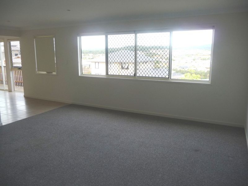 18 Angourie Crescent, Pacific Pines QLD 4211