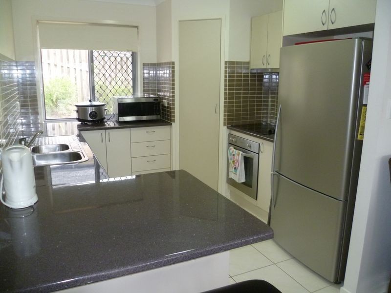 59 Harmsworth Road, Pacific Pines QLD 4211