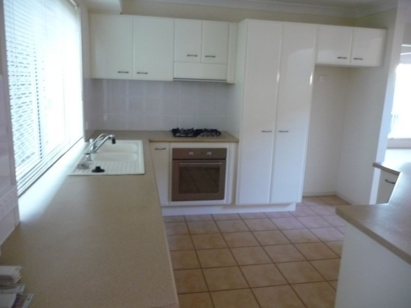 4 THYME COURT, Runaway Bay QLD 4216