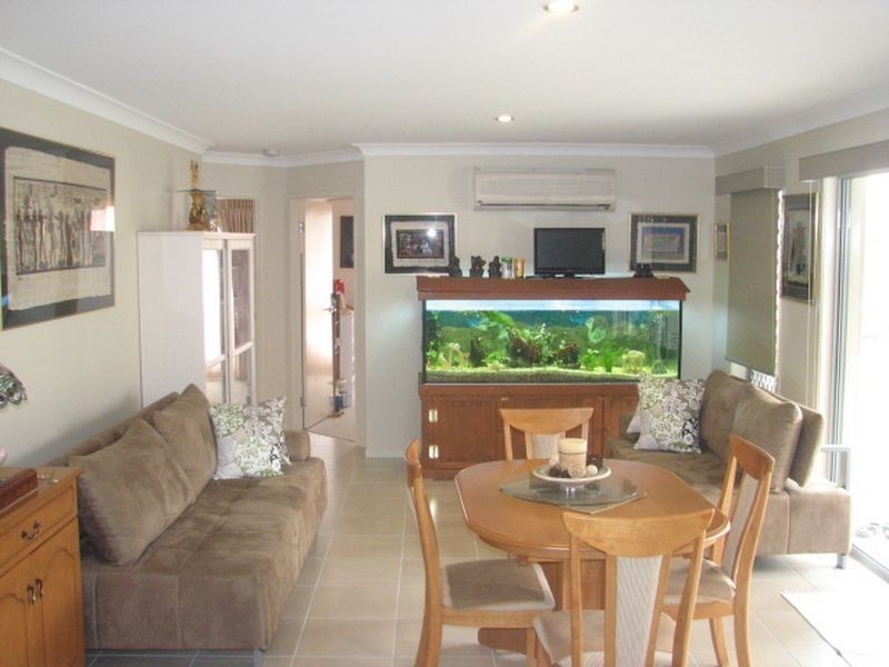 64 Aldgate Crescent, Pacific Pines QLD 4211