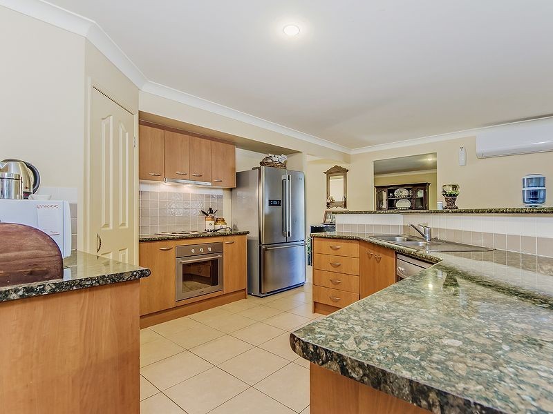 14 Arragan Court, Pacific Pines QLD 4211