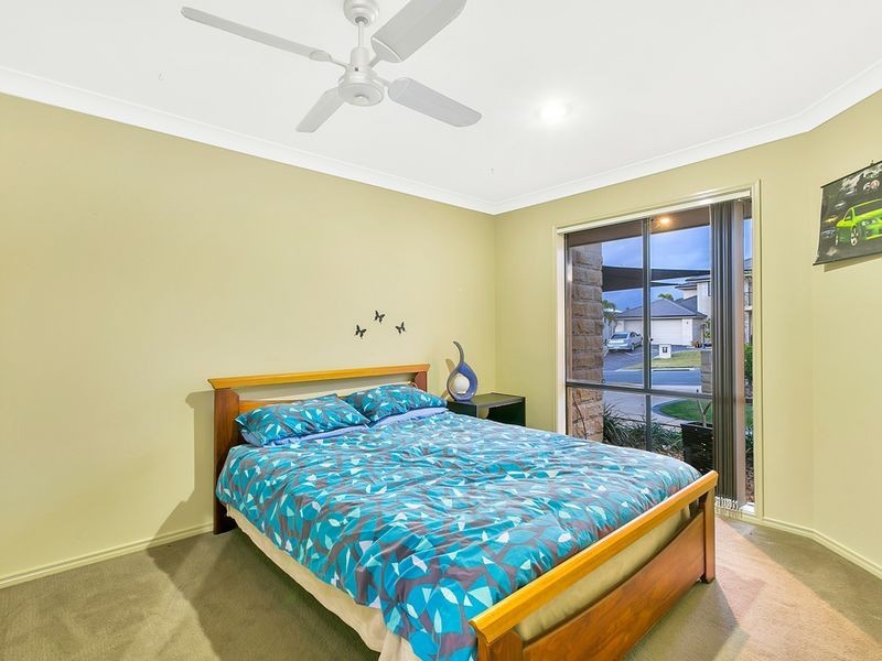 60 Harmsworth Road, Pacific Pines QLD 4211