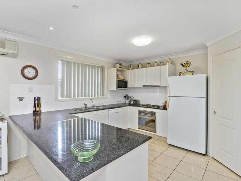 18 Bonner Court, Pacific Pines QLD 4211