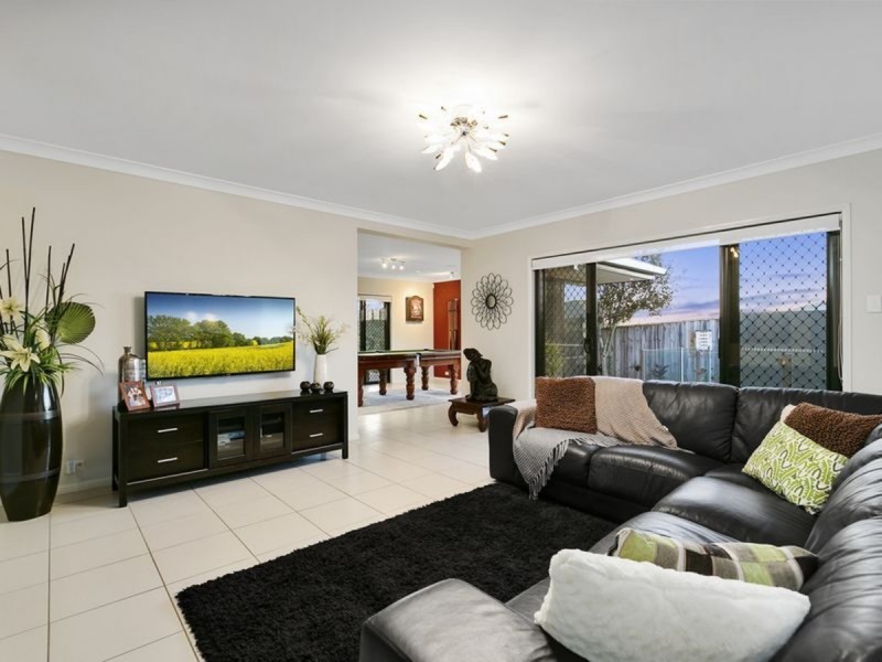 62 Harmsworth Road, Pacific Pines QLD 4211