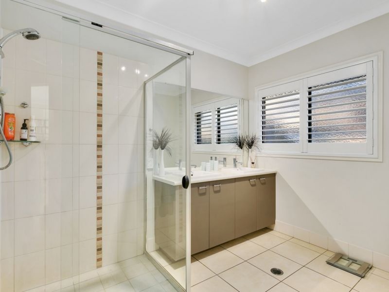 62 Harmsworth Road, Pacific Pines QLD 4211