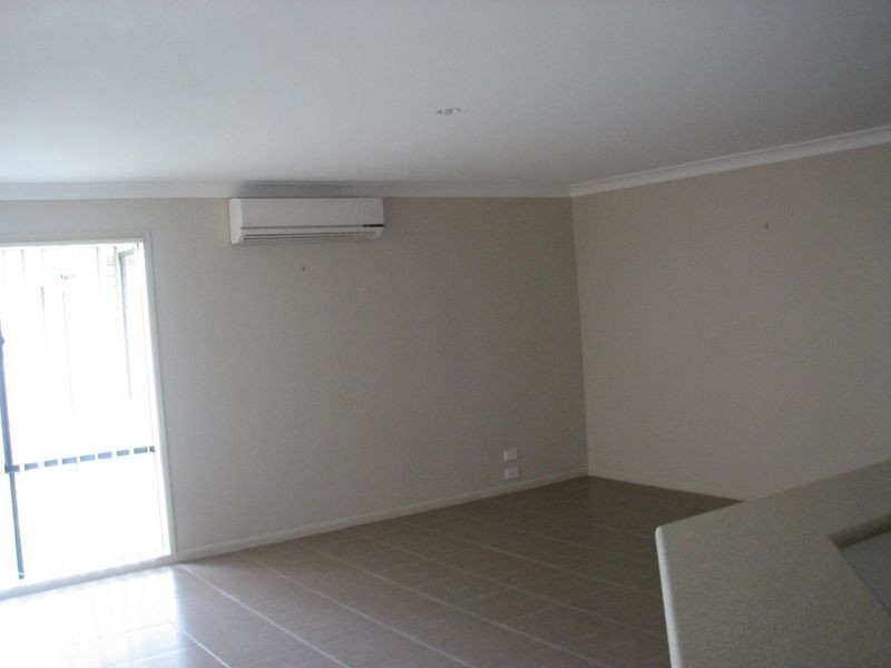 14 Elkins Street, Pacific Pines QLD 4211