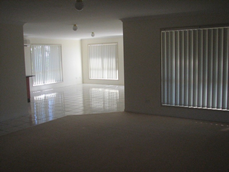 56 Manra Way, Pacific Pines QLD 4211