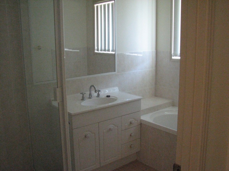 56 Manra Way, Pacific Pines QLD 4211