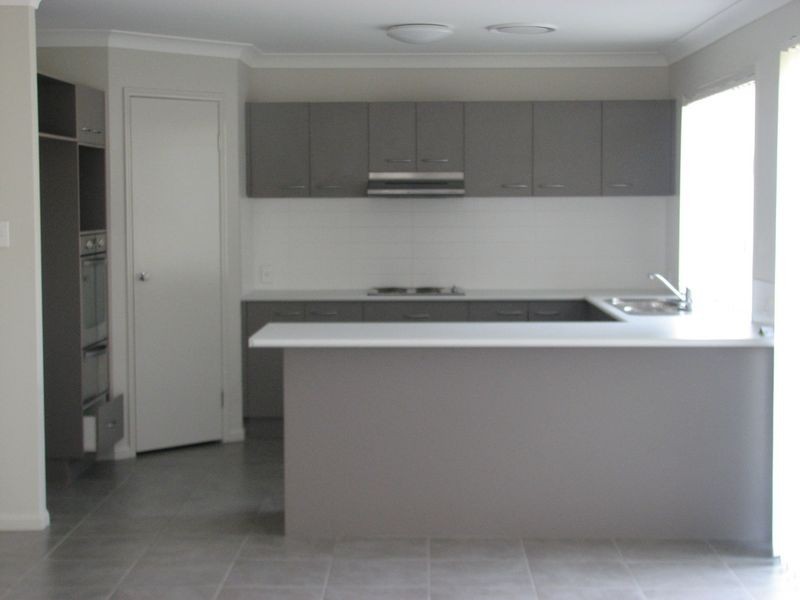 14 Bowley Street, Pacific Pines QLD 4211