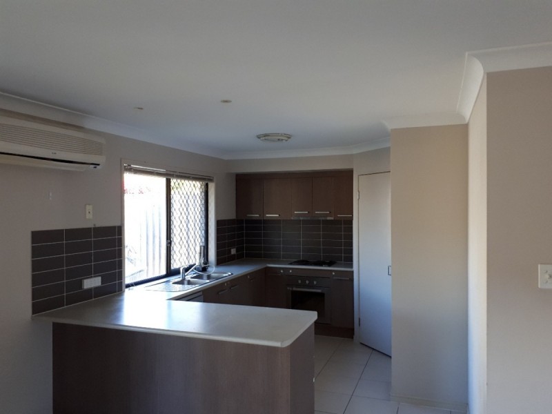 14 Starkey Street, Pacific Pines QLD 4211